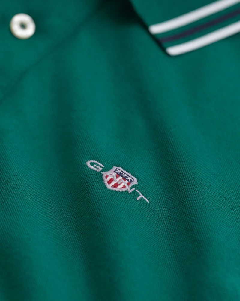 غانت بولو بأكمام قصيرة وياقة مدببة